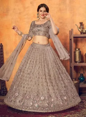 Alluring Soft Net Fabric Thread Work Dusty Brown Color Lehenga Choli