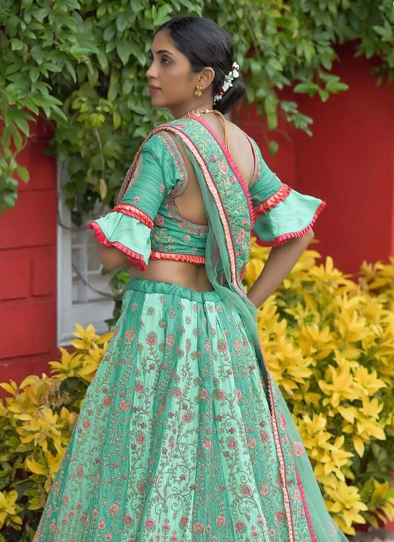 Astounding Silk Base Resham And Zari Work Green Color Lehenga Choli