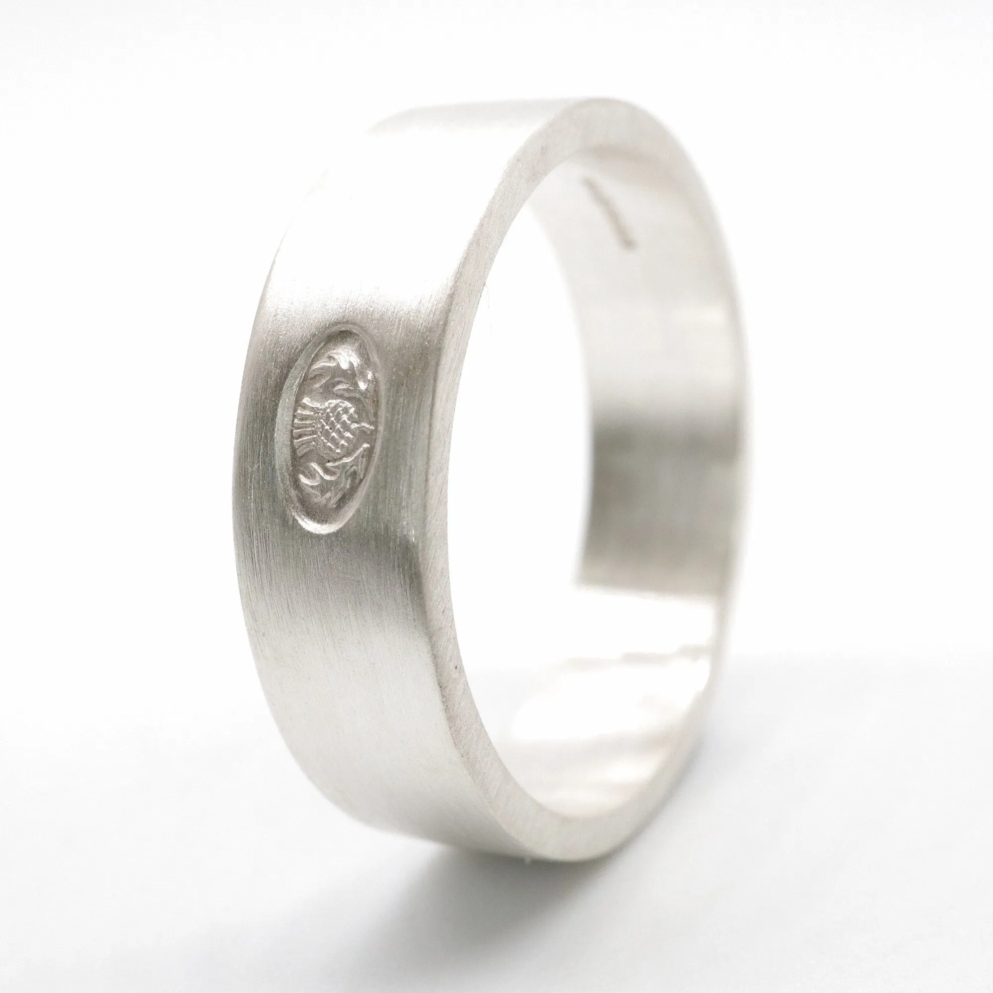 Scottish flat brushed matte white gold wedding ring.