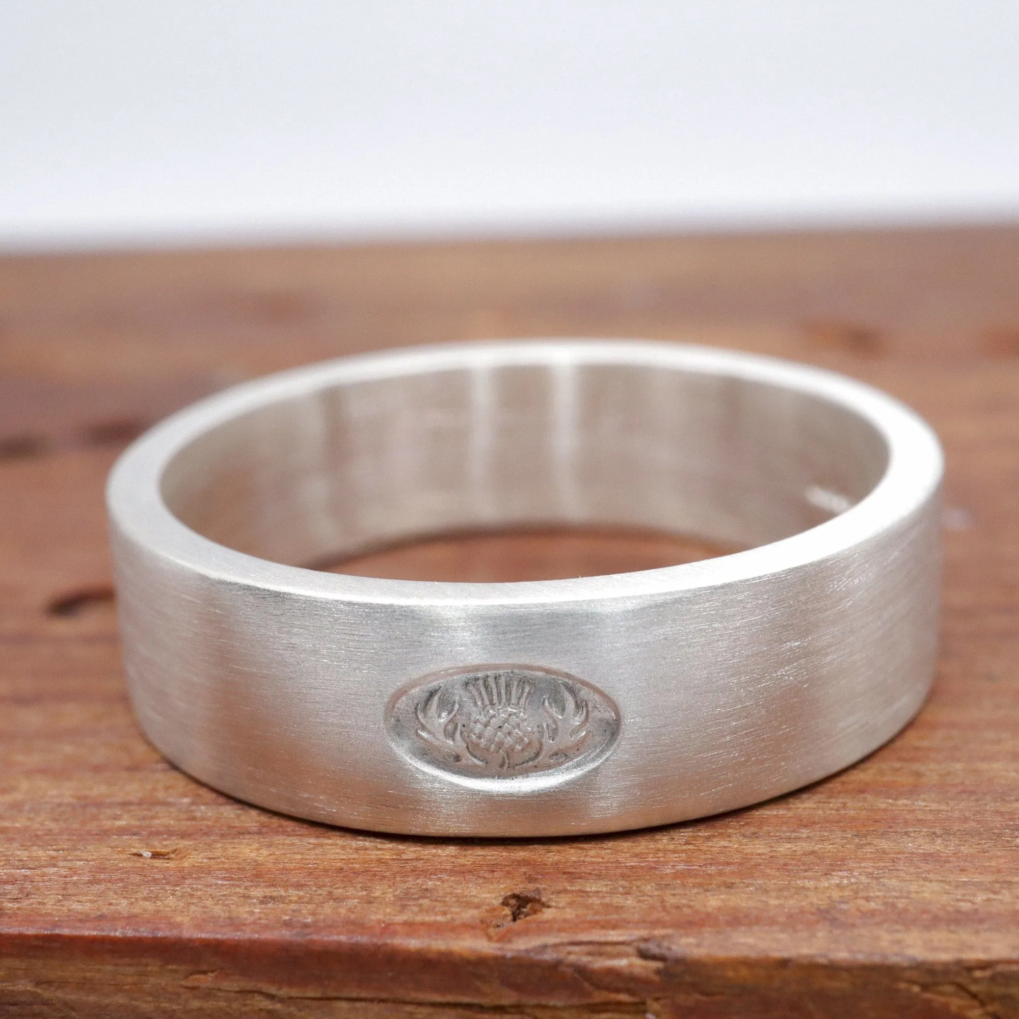 Scottish flat brushed matte white gold wedding ring.