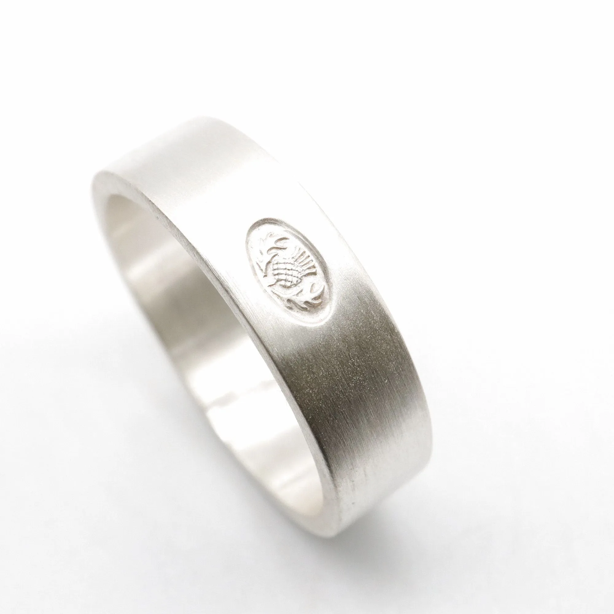 Scottish flat brushed matte white gold wedding ring.