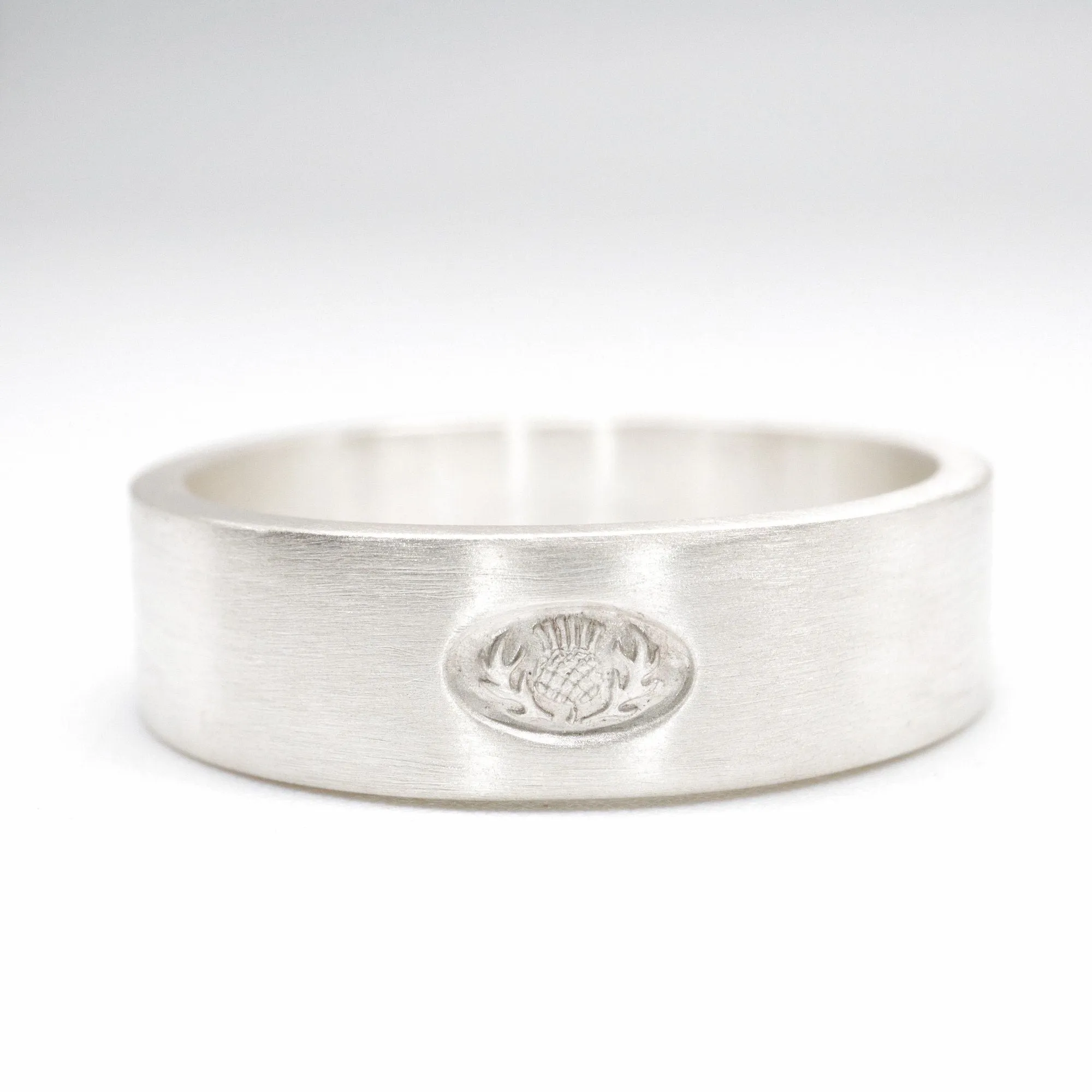 Scottish flat brushed matte white gold wedding ring.